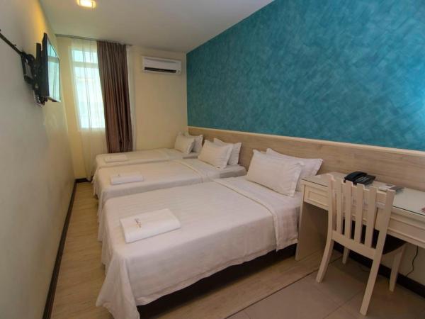 Pantai Inn Kota Kinabalu : photo 2 de la chambre chambre triple