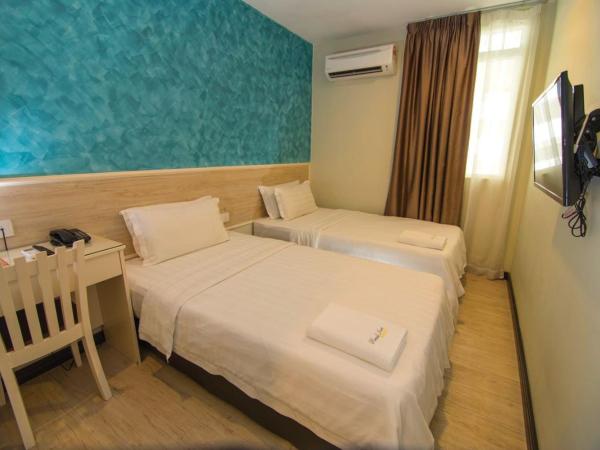 Pantai Inn Kota Kinabalu : photo 3 de la chambre chambre lits jumeaux