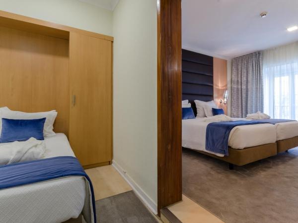 Hotel INN Rossio : photo 1 de la chambre chambre quadruple