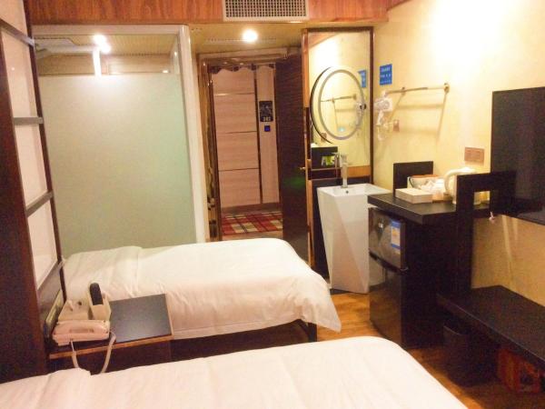 Guangzhou Bird Island Hotel : photo 3 de la chambre chambre lits jumeaux fashion