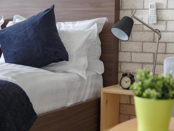 Q Space Residence : photo 6 de la chambre chambre triple exécutive