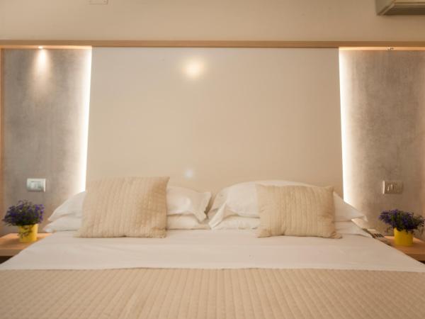 Hotel Ricchi : photo 5 de la chambre chambre quadruple