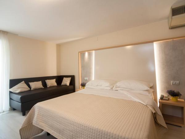 Hotel Ricchi : photo 6 de la chambre chambre quadruple