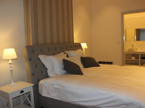 The Hamptons Boutique Hotel : photo 9 de la chambre chambre lit king-size - vue sur jardin