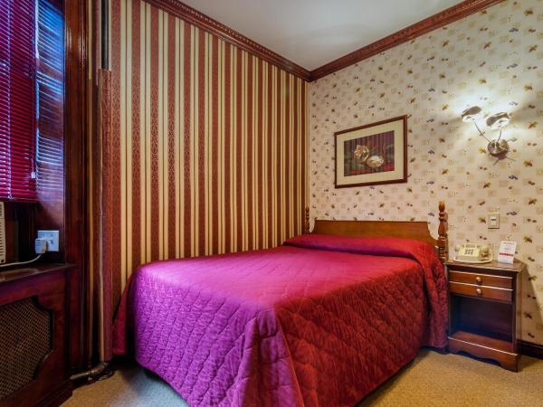 Hotel 31 Extended Stay : photo 2 de la chambre chambre simple avec salle de bains commune