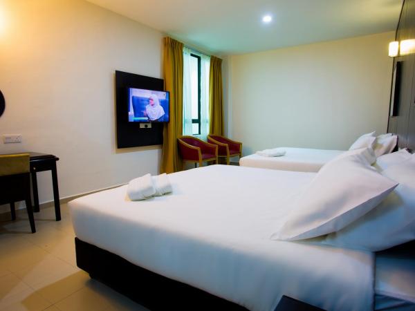 Akar Hotel Jalan TAR : photo 1 de la chambre chambre familiale deluxe