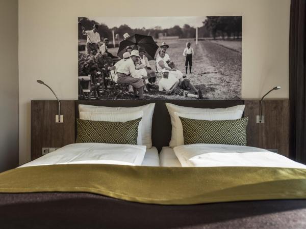 Hotel TheGreen ehemals Köln11 : photo 3 de la chambre standard doppelzimmer ohne aussicht auf den golfplatz