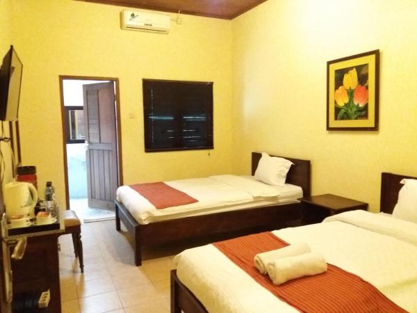 Alam Jogja Resort Mitra RedDoorz : photo 3 de la chambre chambre lits jumeaux