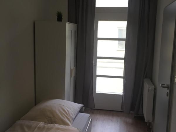 P63 City Rooms Nürnberg Center : photo 2 de la chambre chambre simple