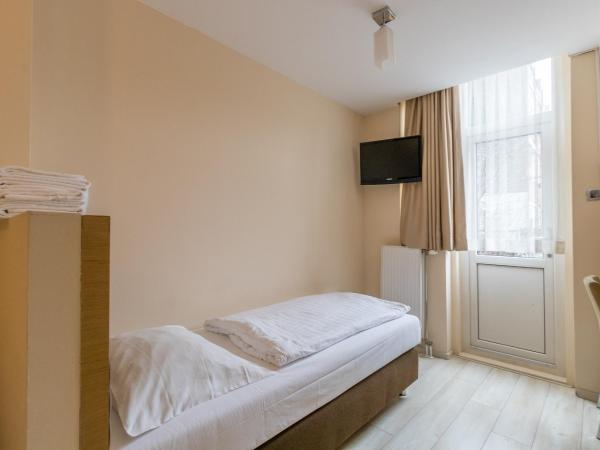 Hotel Port : photo 7 de la chambre chambre quadruple