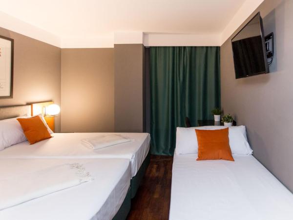 Hotel Malcom and Barret : photo 8 de la chambre chambre triple