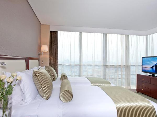 Regal Plaza Hotel & Residence : photo 7 de la chambre deluxe king bed one room and one living room