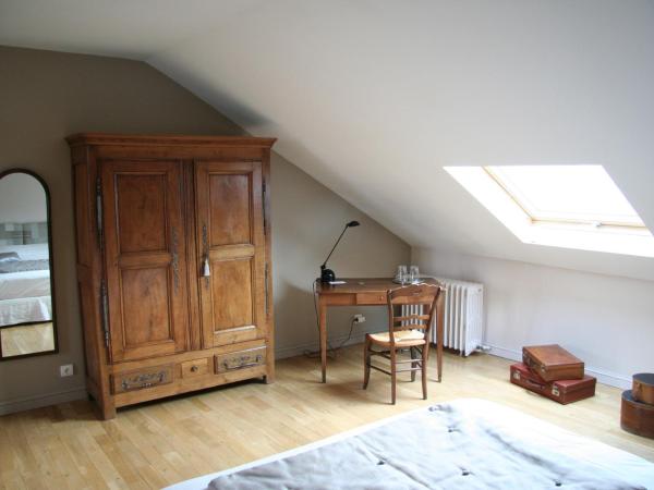 Chambres d'hôtes Le Clos d'Hauteville : photo 1 de la chambre chambre double ou lits jumeaux avec salle de bains privative