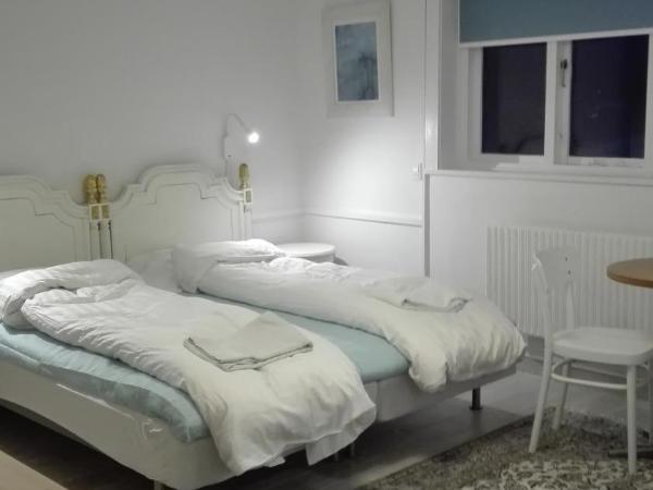 Royaltybed Copenhagen : photo 9 de la chambre chambre triple avec salle de bains commune