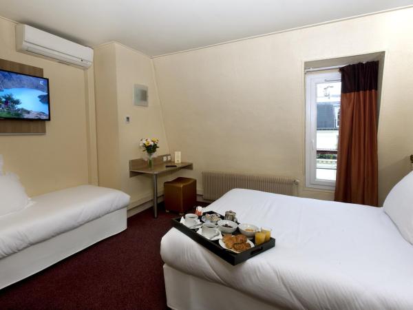 Hôtel de France Quartier Latin : photo 1 de la chambre chambre triple