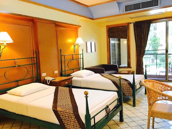 Pung-Waan Resort & Spa : photo 1 de la chambre chambre double ou lits jumeaux supérieure - vue sur jardin