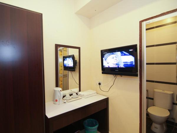 Anggerik Lodging : photo 3 de la chambre bunga raya standard double room