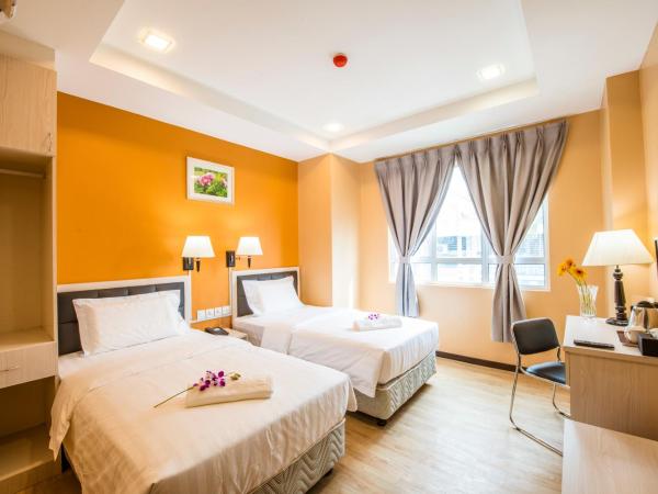 inHotel Inanam : photo 4 de la chambre chambre lits jumeaux