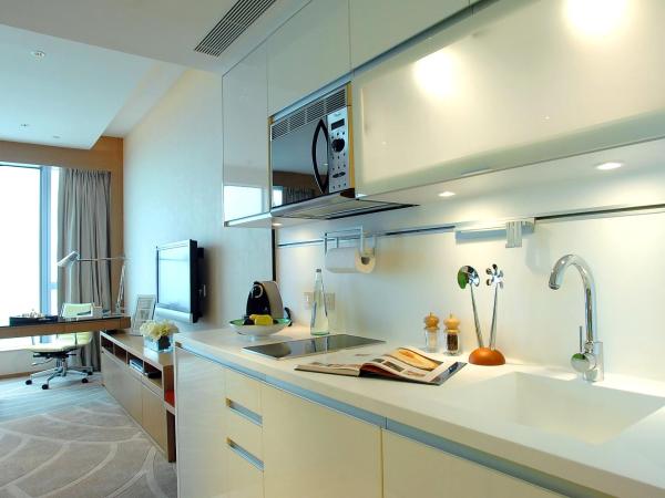 The HarbourView Place @ the ICC megalopolis : photo 2 de la chambre chambre lit king-size deluxe