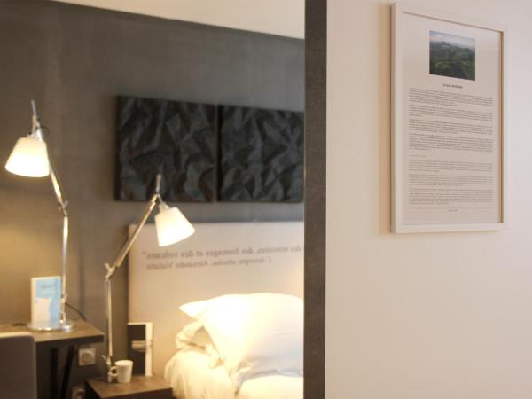 Hotel Litteraire Alexandre Vialatte, BW Signature Collection : photo 6 de la chambre chambre triple suprieure avec vue