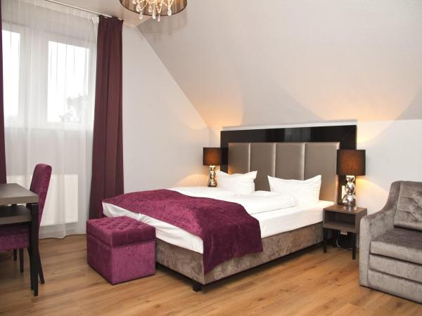 Arena Villa am Wasserpark : photo 2 de la chambre chambre triple