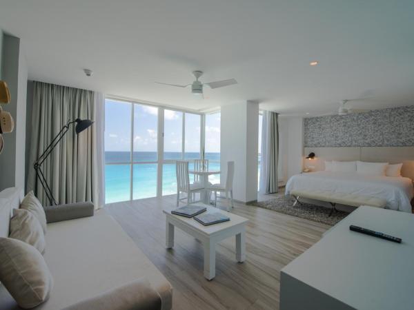 Oleo Cancun Playa All Inclusive Resort : photo 3 de la chambre suite junior inspira côté océan avec Équipements premium 