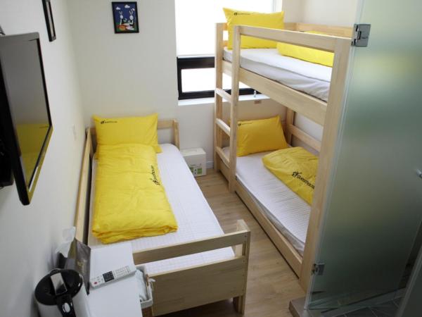 24 Guesthouse Dongdaemun Market : photo 9 de la chambre chambre triple