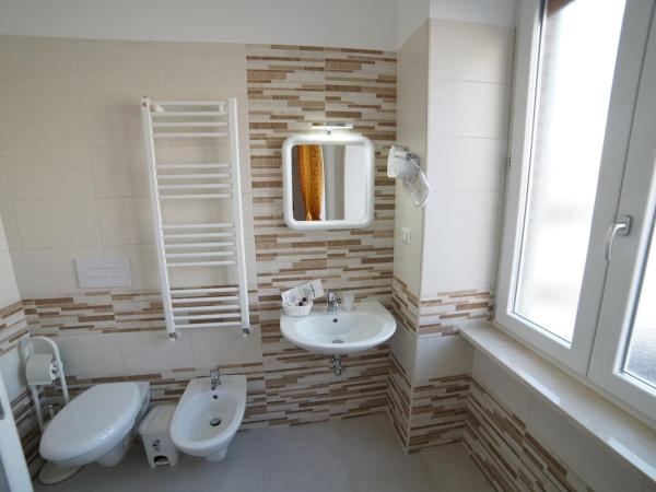 La Casa dei Sogni : photo 2 de la chambre chambre triple