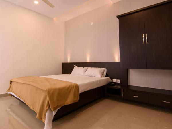 Ajantha Komforts, Bengaluru : photo 5 de la chambre chambre lits jumeaux deluxe