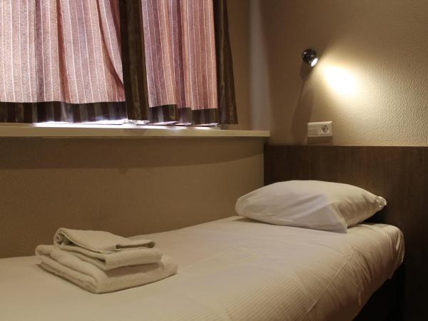 Blossoms City Hotel : photo 1 de la chambre petite chambre simple