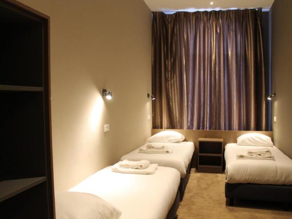 Blossoms City Hotel : photo 1 de la chambre chambre triple