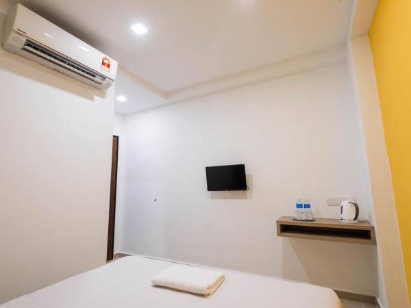 HomeStay 21 Hotel : photo 3 de la chambre chambre lit queen-size