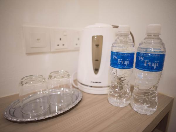 HomeStay 21 Hotel : photo 8 de la chambre chambre lit queen-size