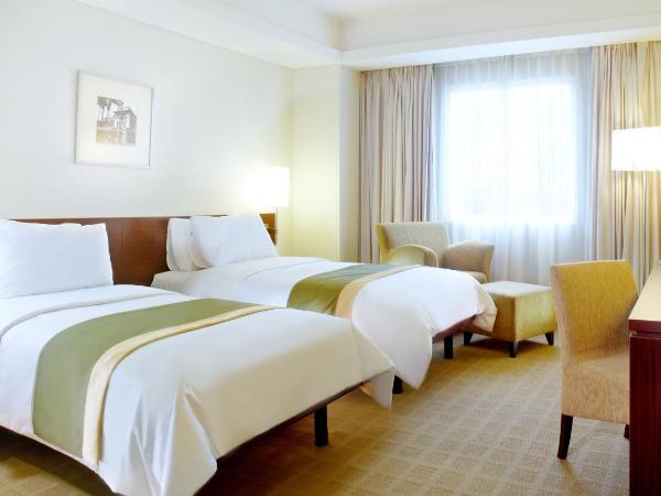 Java Paragon Hotel & Residences : photo 3 de la chambre chambre lits jumeaux deluxe