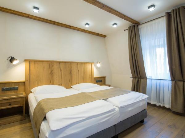 Hotel Malé Versailles : photo 3 de la chambre chambre double ou lits jumeaux