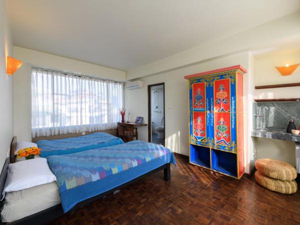 Dondrub Guest House : photo 1 de la chambre chambre lits jumeaux supérieure