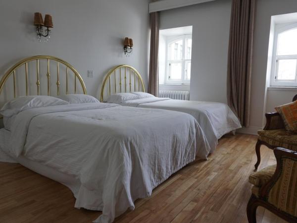 Hôtel Marie-Rollet : photo 6 de la chambre chambre double avec 2 lits doubles