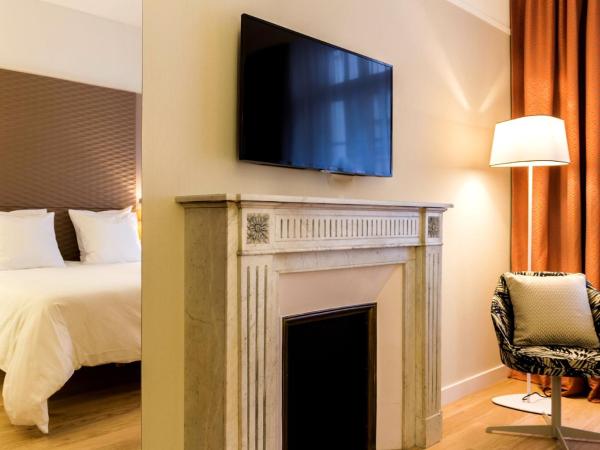 Hôtel Oceania Le Métropole : photo 1 de la chambre chambre double supérieure - vue sur piscine et jardin