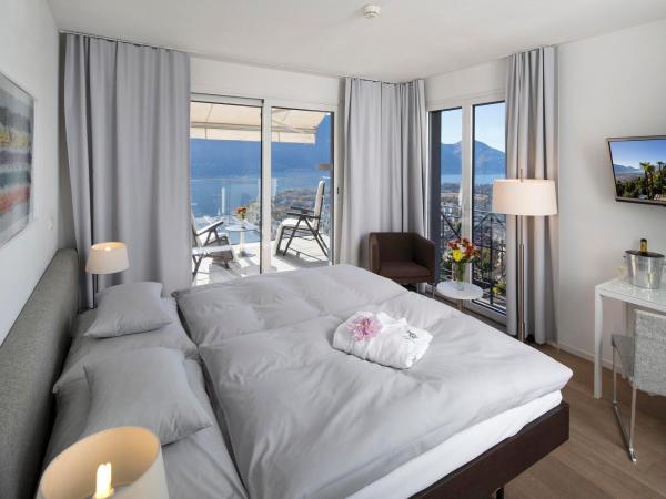 Hotel Stella SA : photo 1 de la chambre chambre double ou lits jumeaux premium - vue sur lac