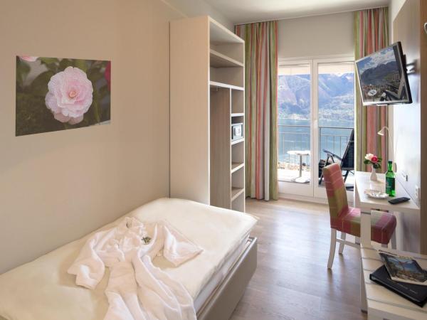 Hotel Stella SA : photo 1 de la chambre chambre simple lifestyle - vue sur lac