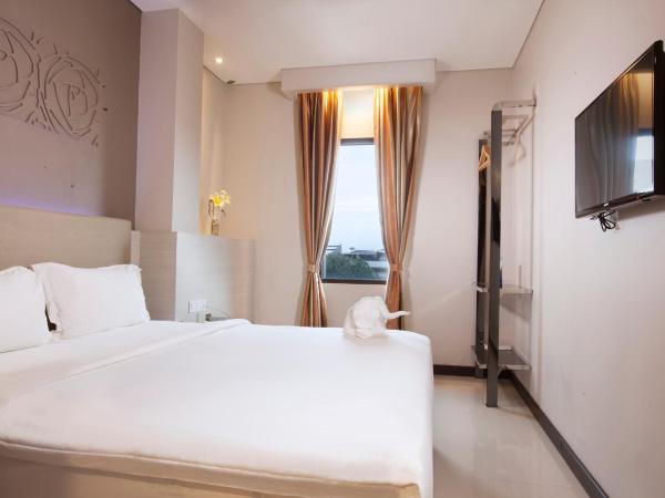 Verse Lite Hotel Gajah Mada : photo 1 de la chambre chambre supérieure lit queen-size
