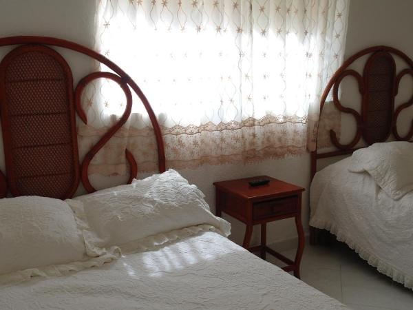 Villa Cupatitzio : photo 2 de la chambre bungalow 2 chambres