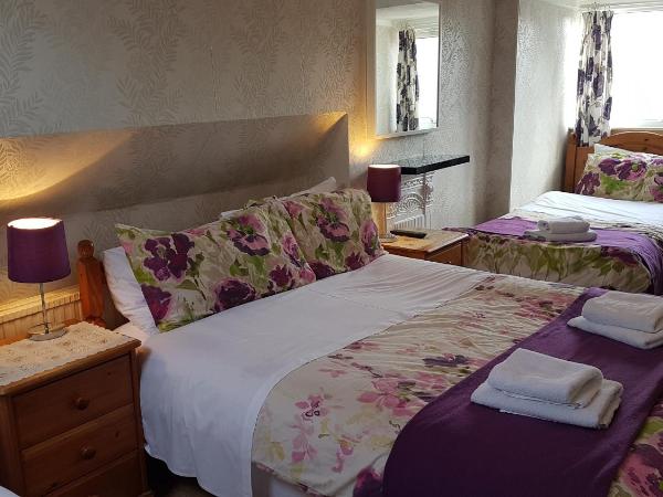 Adams Guest House : photo 3 de la chambre chambre familiale (4 adultes)