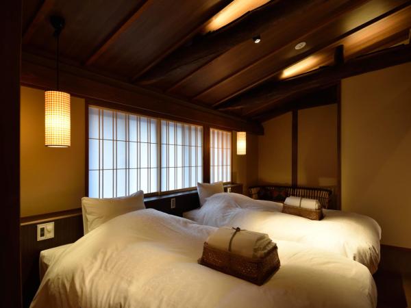 Muromachi Yutone Kyokoyado : photo 3 de la chambre chambre lits jumeaux avec salle de bains privative - fujimurasaki
