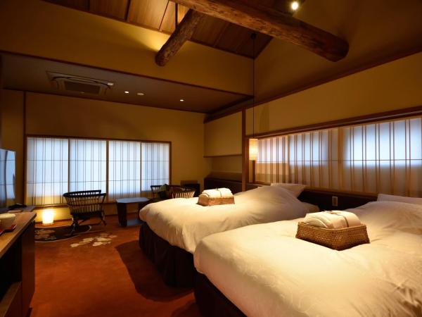 Muromachi Yutone Kyokoyado : photo 1 de la chambre chambre triple avec salle de bains privative - botan