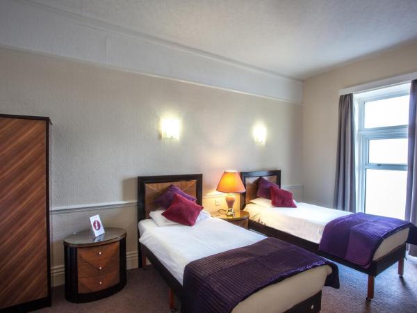 The Metropole Hotel : photo 1 de la chambre chambre lits jumeaux - vue sur mer