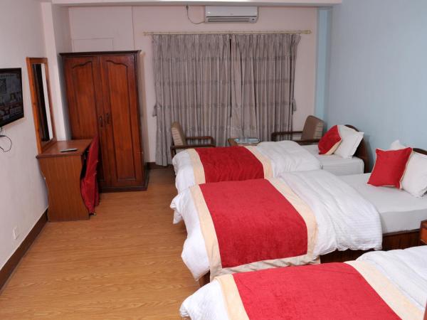 Hotel Brihaspati : photo 3 de la chambre chambre triple deluxe