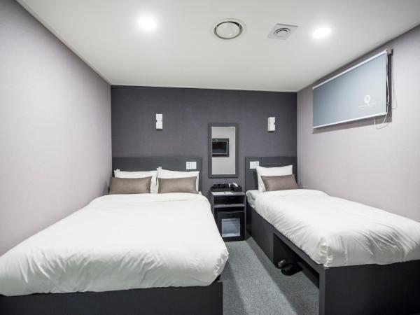 Philstay Myeongdong Metro : photo 2 de la chambre chambre triple