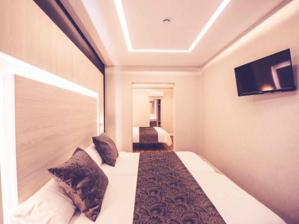 Hostal Lisboa : photo 3 de la chambre chambre quadruple