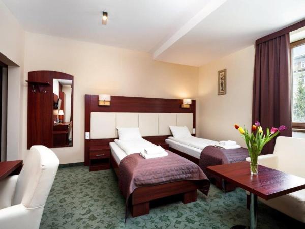 Hotel Młyn : photo 2 de la chambre chambre lits jumeaux